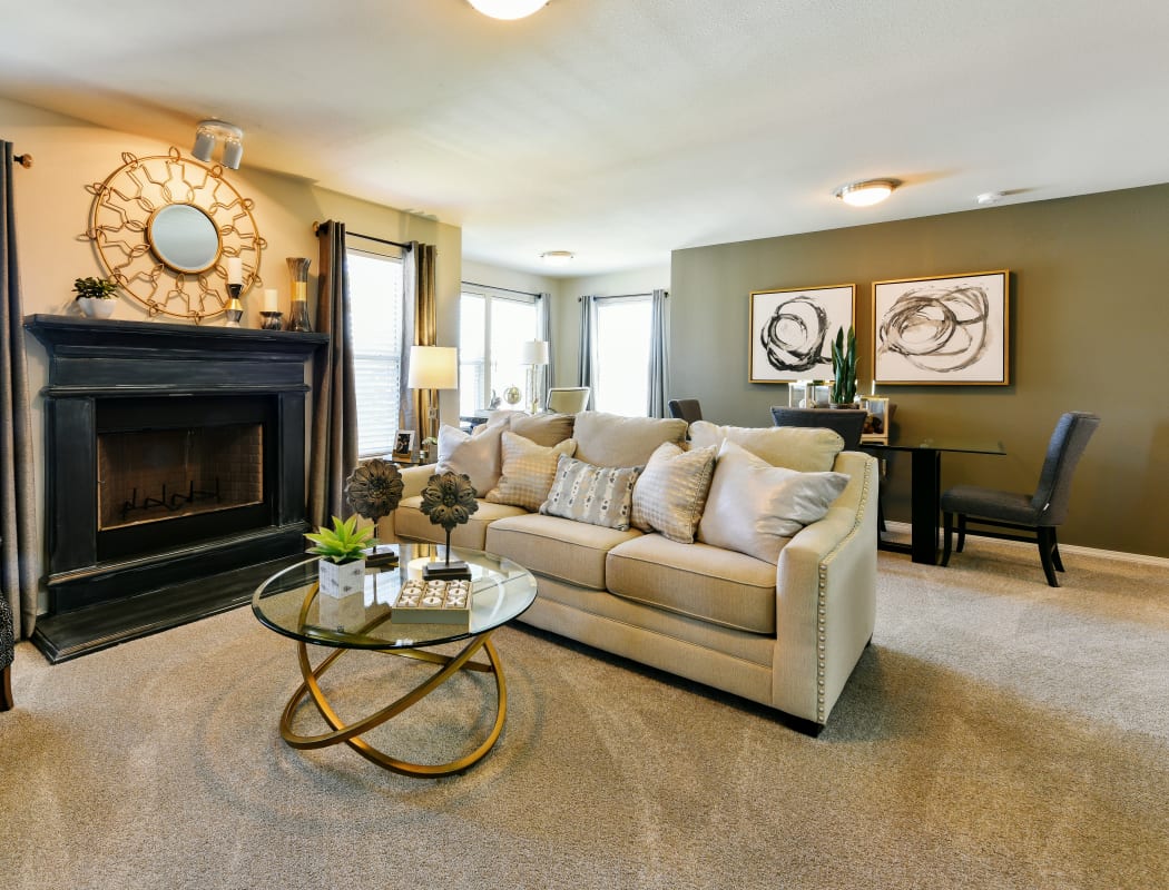 Beautiful, spacious living room at Cottages at Abbey Glen Apartments in Lubbock, Texas