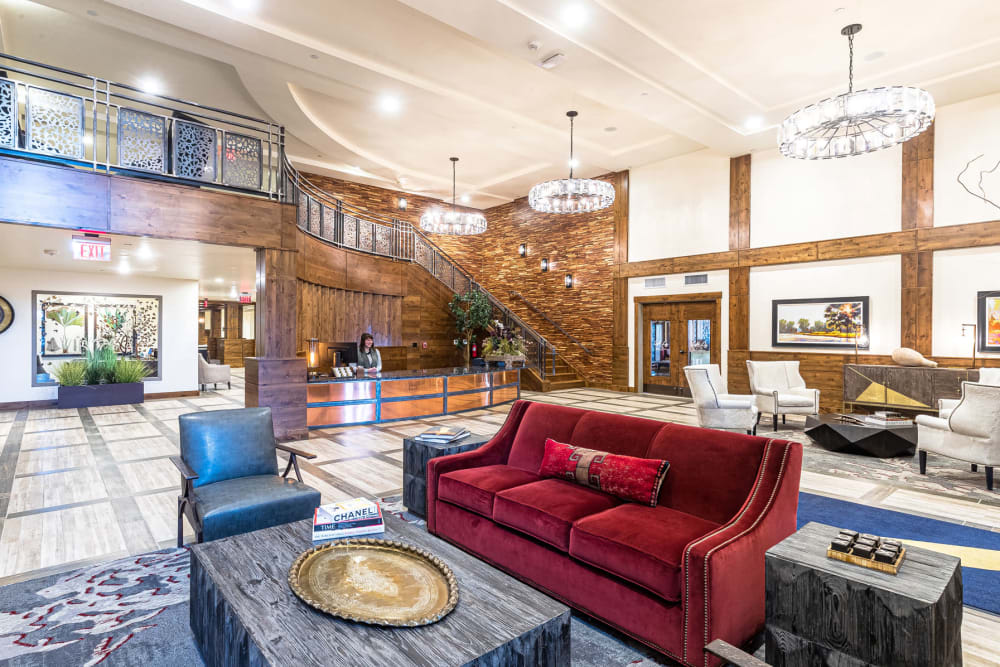 Front desk with seating and lounge area at Touchmark at Pilot Butte in Bend, Oregon