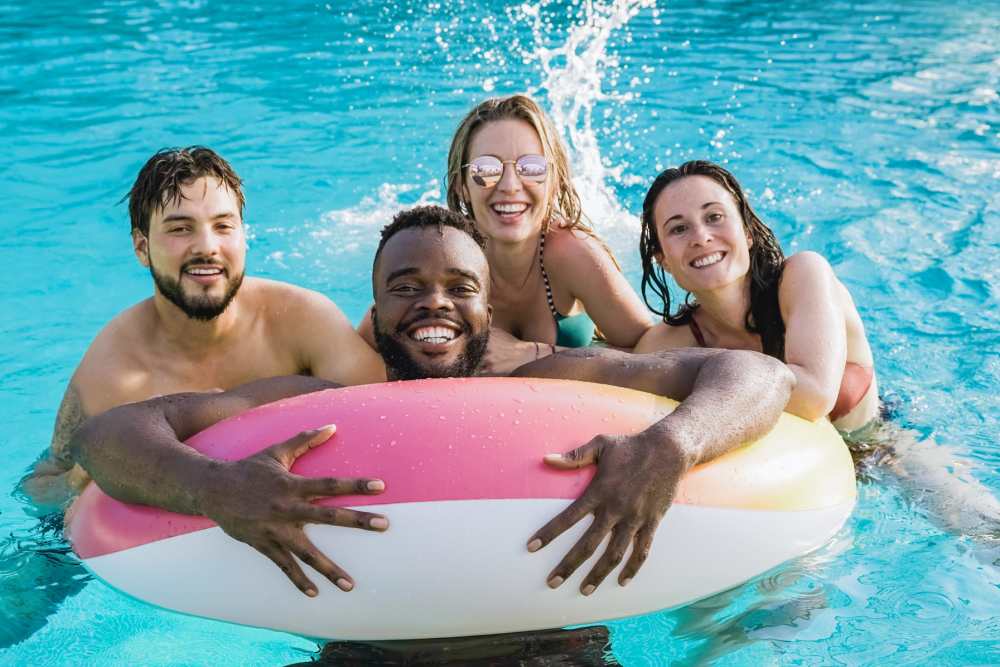 Friends swimming at Copper Square in Lancaster, California
