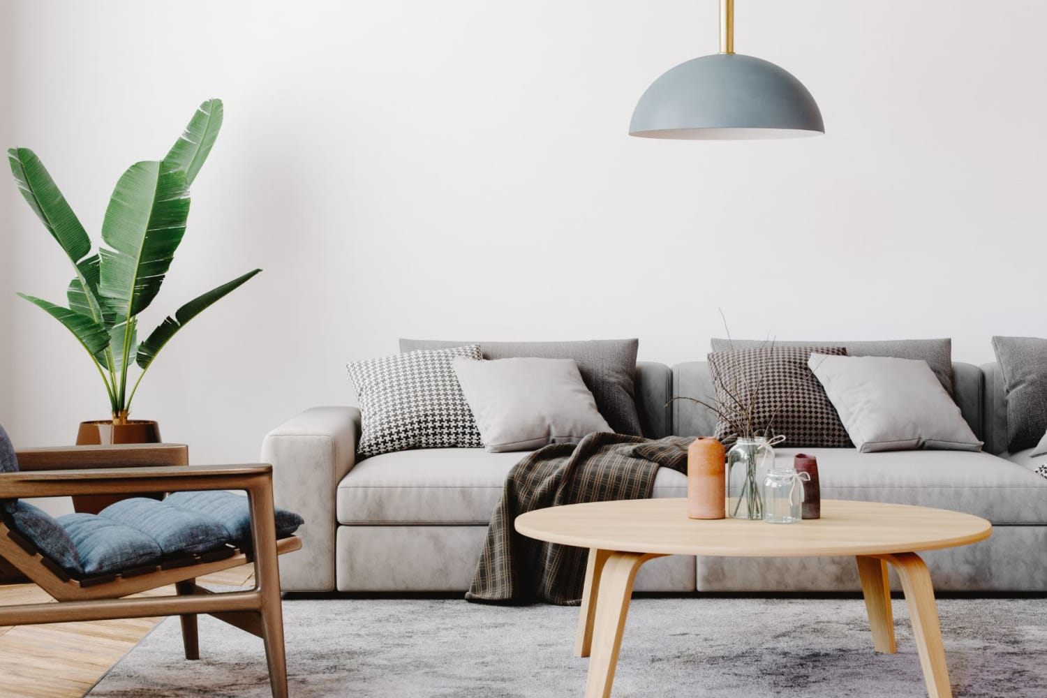 Modern furnishings in a model home's living space at Springdale West Apartments in Long Beach, California