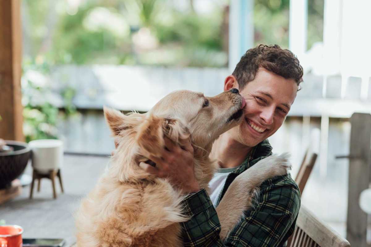 Resident with his dog at Kimberly Pointe in Houston, Texas
