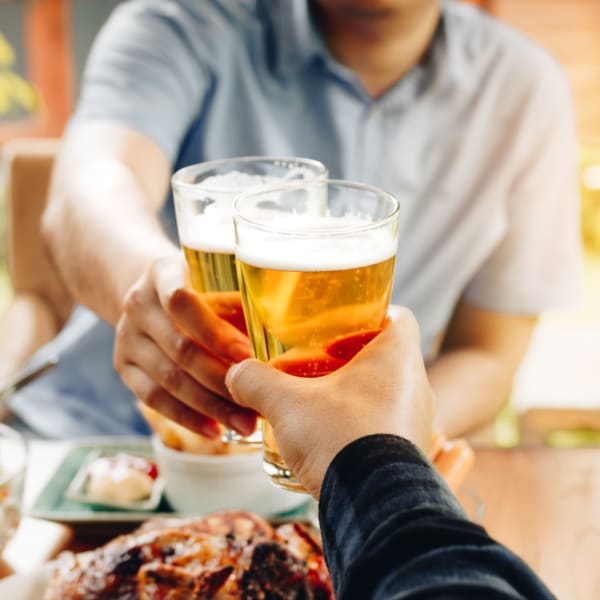 Residents having beer near The Manchester Apartments in Euless, Texas