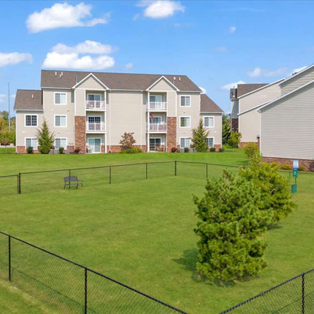 Pet park  at The Haven at Grand Landing Apartments in Grand Haven, Michigan