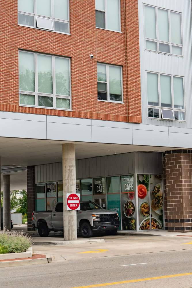 Exterior view of apartment and cafe on the ground floor at Diamond Place II in Grand Rapids, Michigan