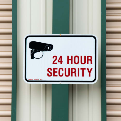 A 24 hour security sign at Red Dot Storage in Winchester, Kentucky