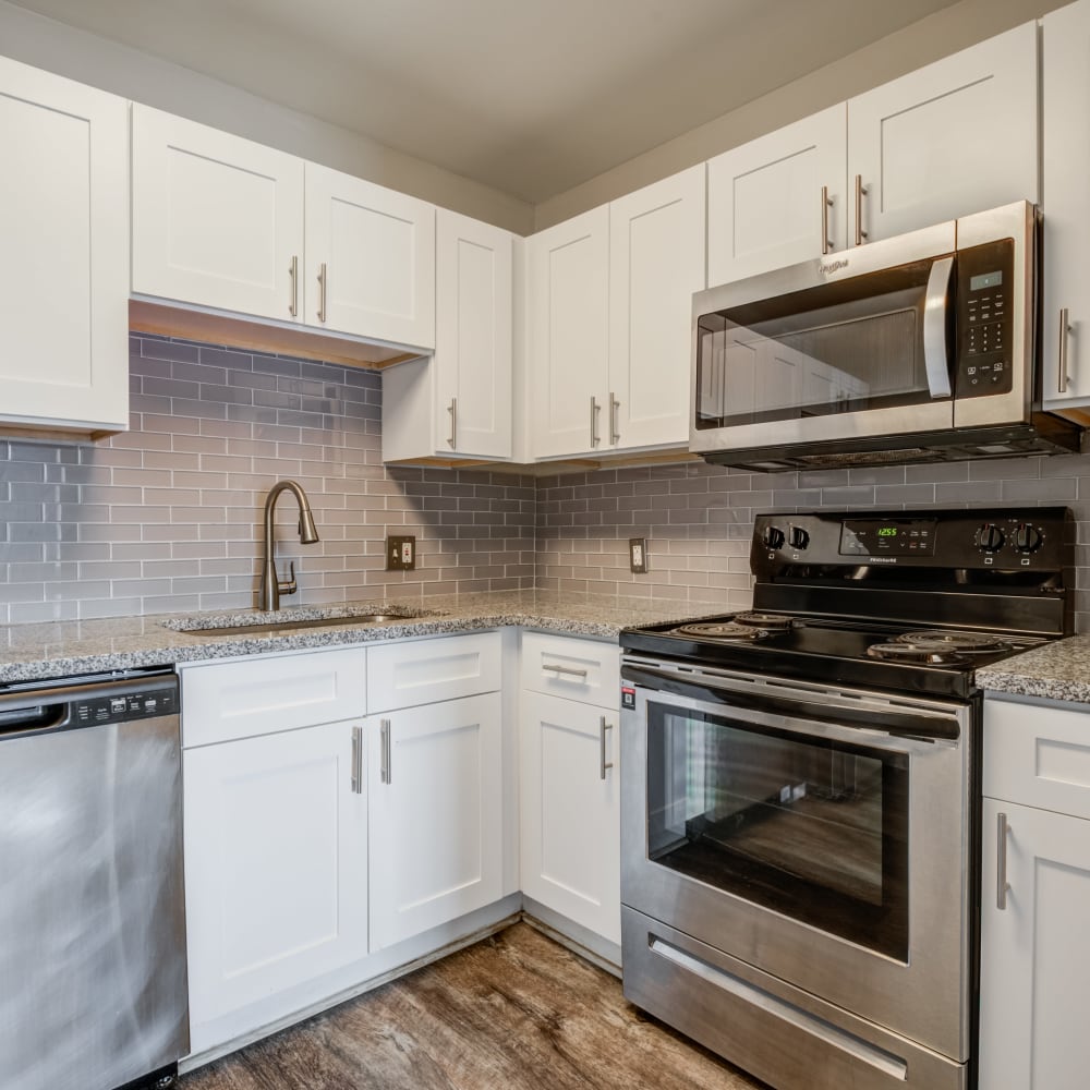 Kitchen with stainless appliances at The Summit at Ridgewood in Fort Wayne, Indiana