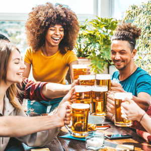 A group of friends having a beer at The Grand at Bayfront in Hercules, California