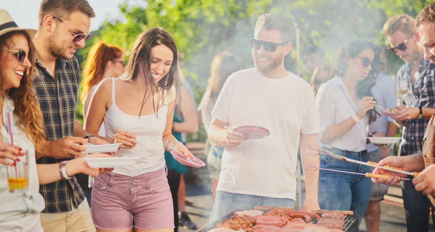 Grilling in the backyard with friends Tapestry Homes in Hickory, North Carolina