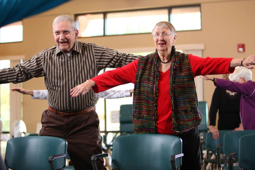 Resident couple doing exercise/dance class at Brookstone Estates of Mattoon South in Mattoon, Illinois