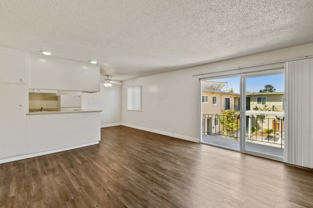 Living room and kitchen at Marina Haven Apartment Homes in San Leandro, California