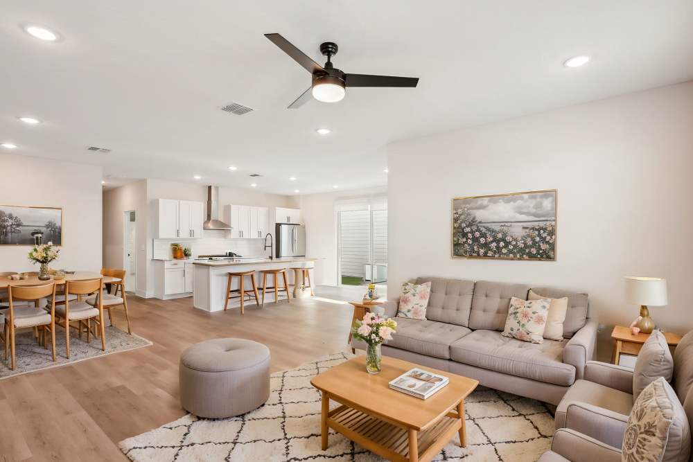 Bedroom with a comfortable bed and a ceiling fan at BB Living Sweetwater Crossing in Bee Cave, Texas