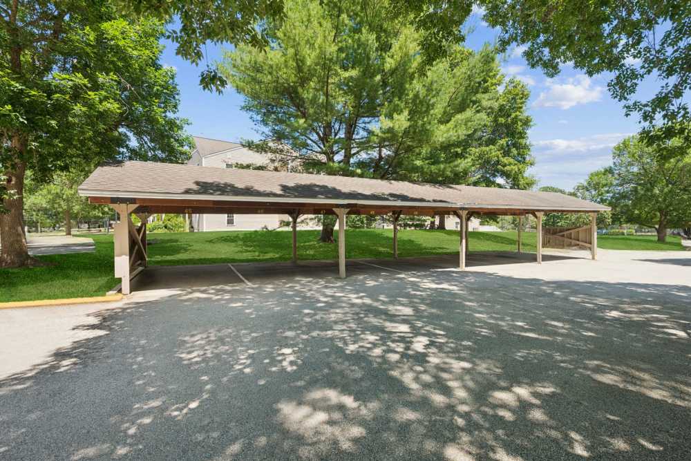 Covered carport parking at Bay Ridge at Nashua Apartments in Nashua, New Hampshire