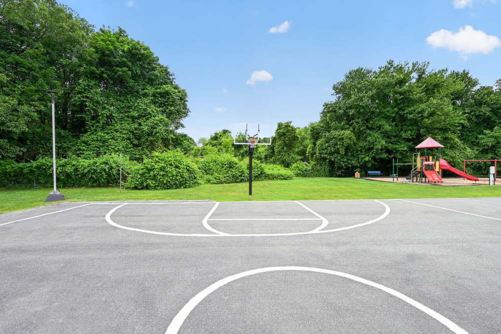 Play area next to basketball court at Park Village West in Westborough, Massachusetts