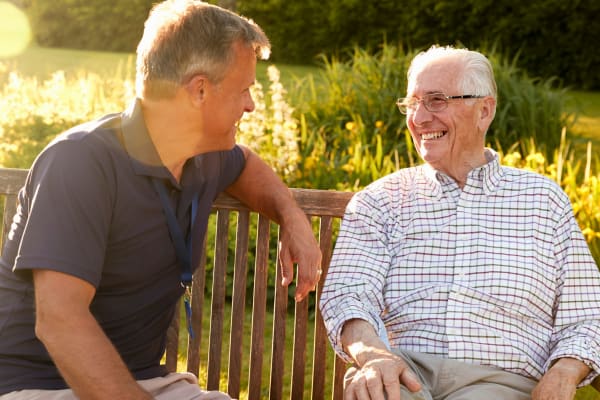 A man and his father conversing at Ramsey Village Continuing Care in Des Moines, Iowa
