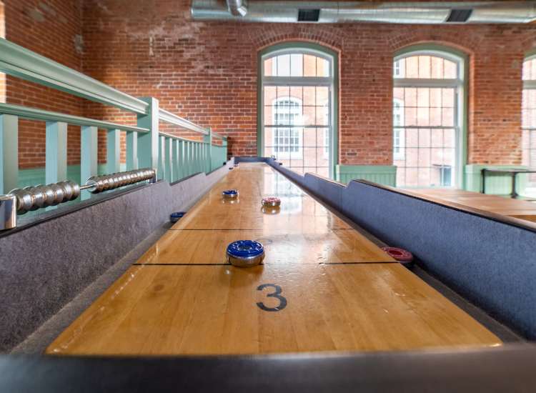 Shuffleboard table at Linwood Mill Apartments in Whitinsville, Massachusetts