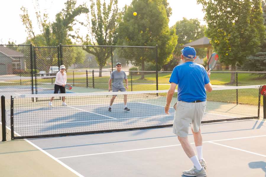 Residents playing an outdoor game at Touchmark at Meadow Lake Village in Meridian, Idaho