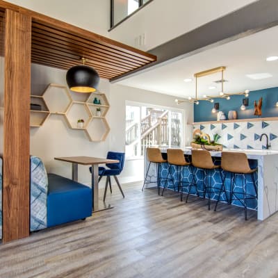 Resident clubhouse lounge and demonstration kitchen at Veranda La Mesa in La Mesa, California