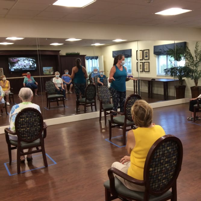 Residents social distancing during presentation at Grand Villa of Palm Coast in Palm Coast, Florida