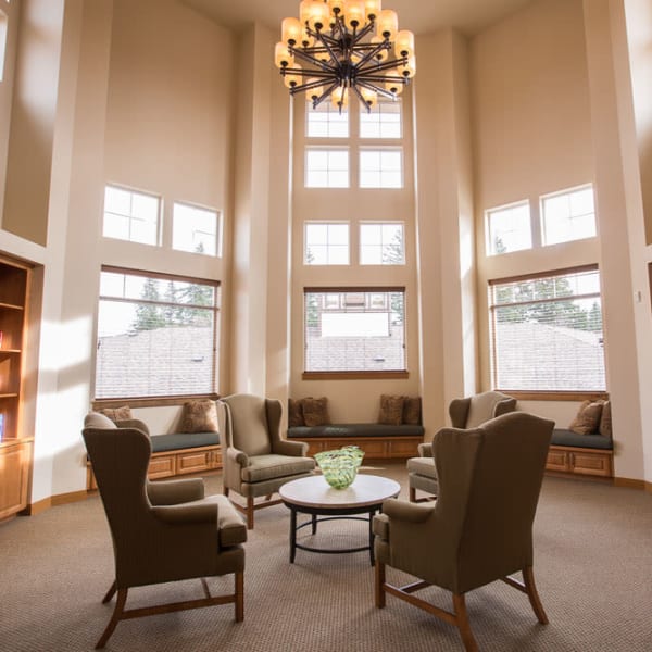 Sunlit reading room at Quail Park at Browns Point in Tacoma, Washington