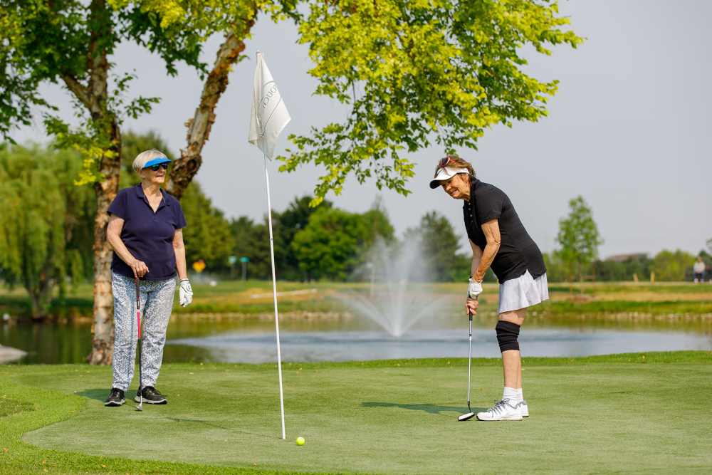 Residents golfing at Touchmark at Meadow Lake Village in Meridian, Idaho