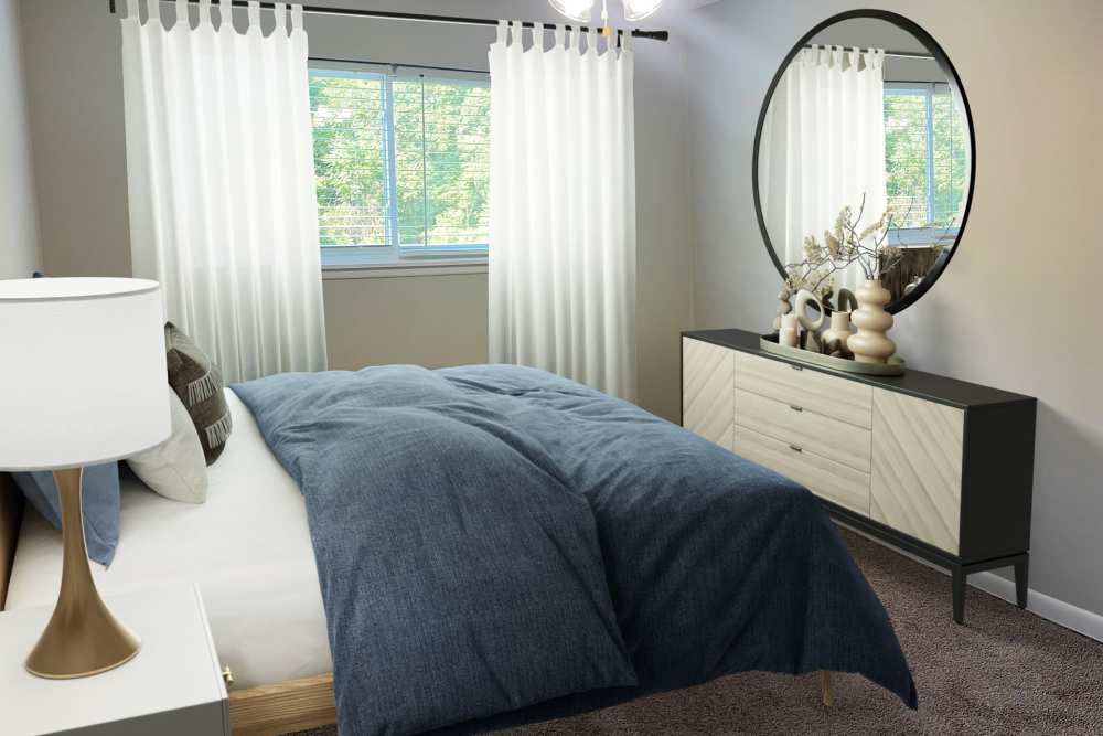 Carpeted bedroom at Candlewood Apartment Homes in Nashville, Tennessee