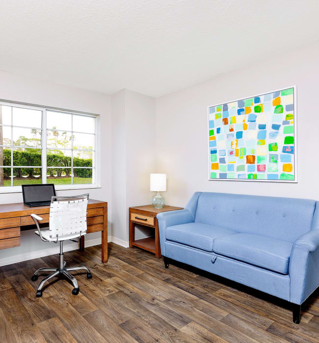 Model bedroom set up as an office at Weston Place Apartments in Weston, Florida