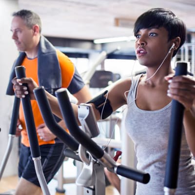 Residents using exercise equipment at Miramar Townhomes in San Diego, California