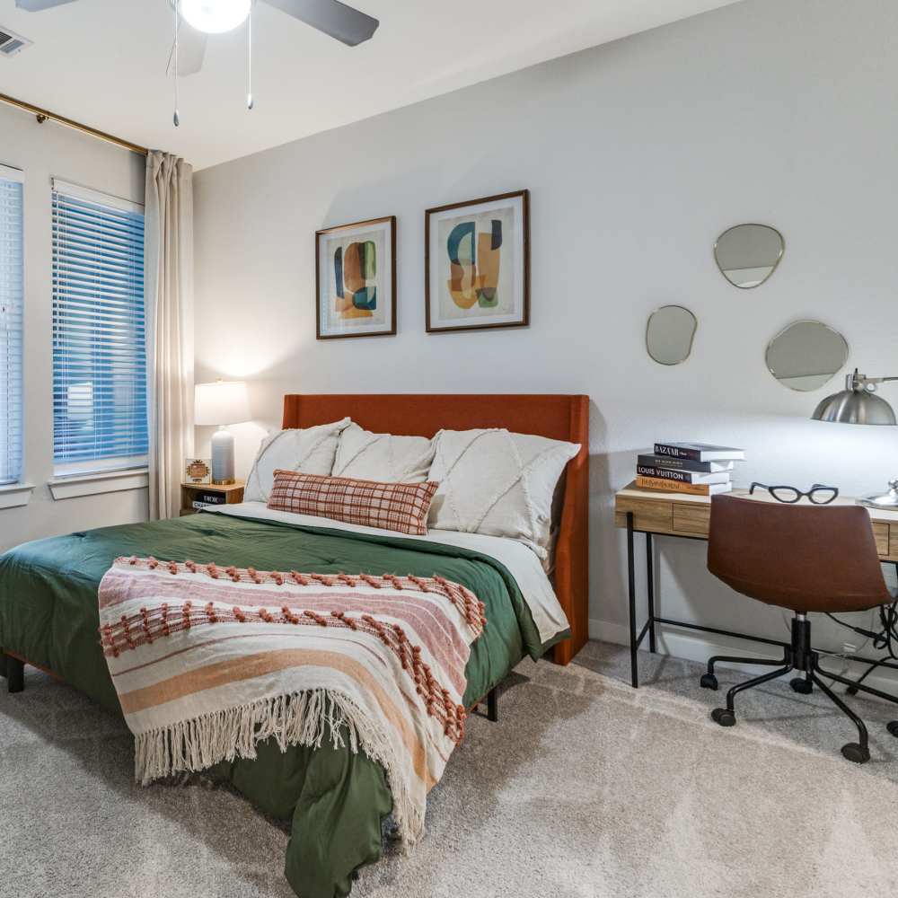 Dining and living area of an apartment home at Skyline Trinity in Dallas, Texas