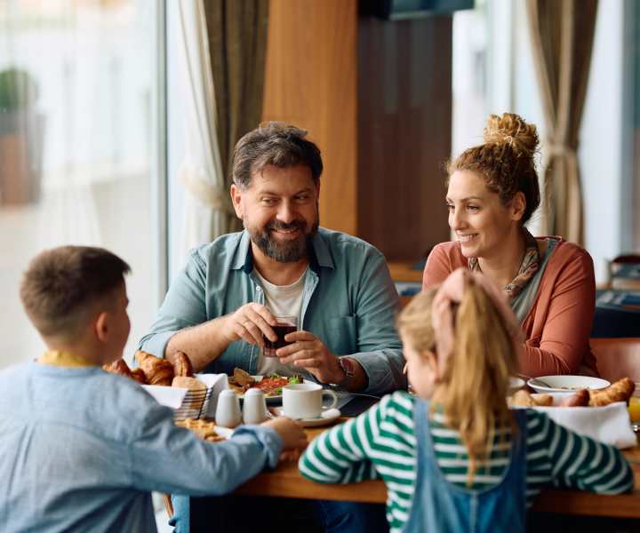Residents enjoying a meal at a restaurant near Banyan Club East in Pompano Beach, Florida