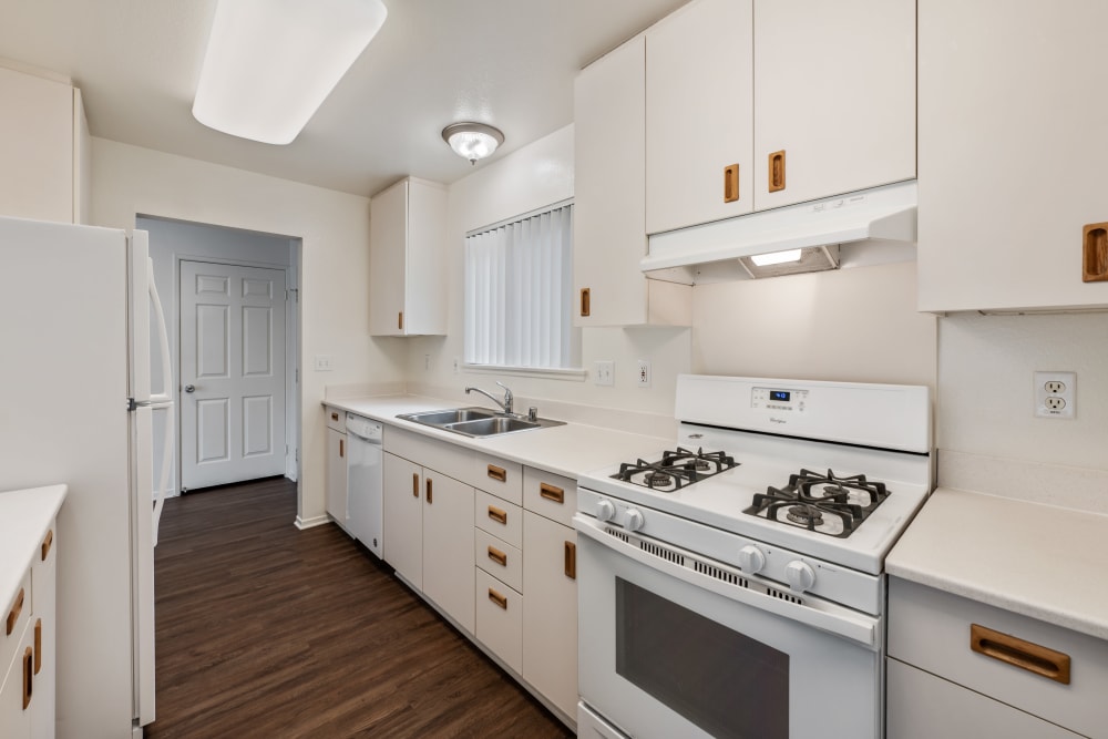 Wood flooring in an upgraded townhome kitchen at Bard Estates in Port Hueneme, California