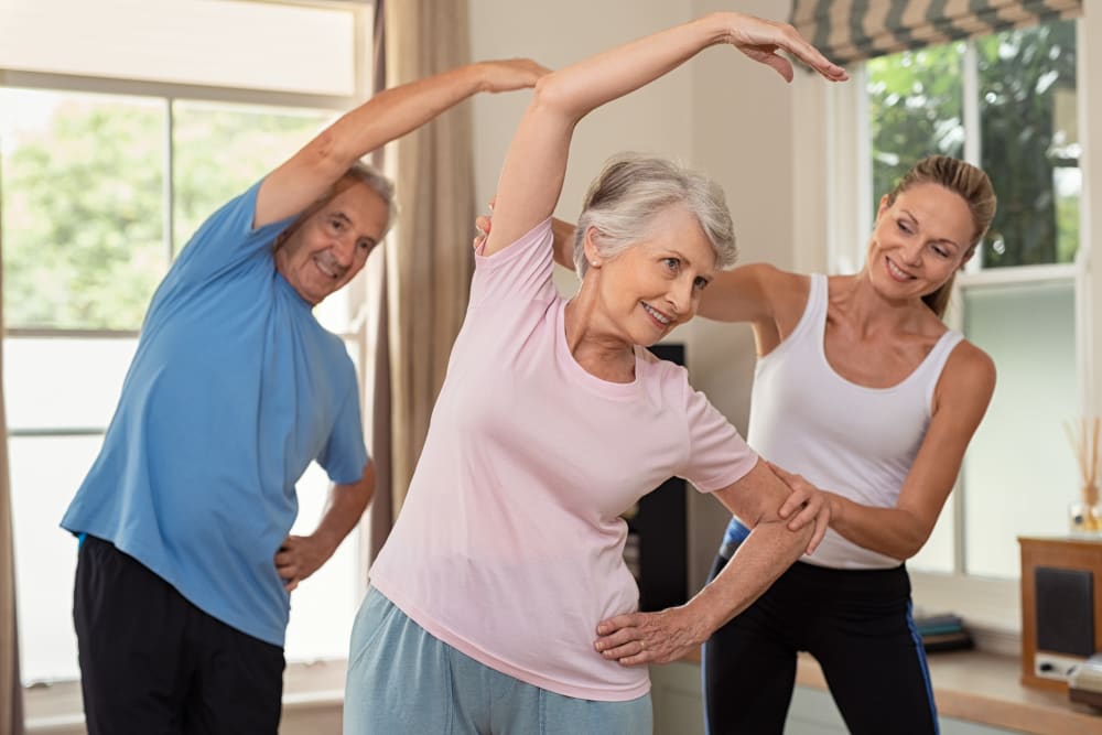 Residents taking an exercise class at WellQuest of Elk Grove in Elk Grove, California