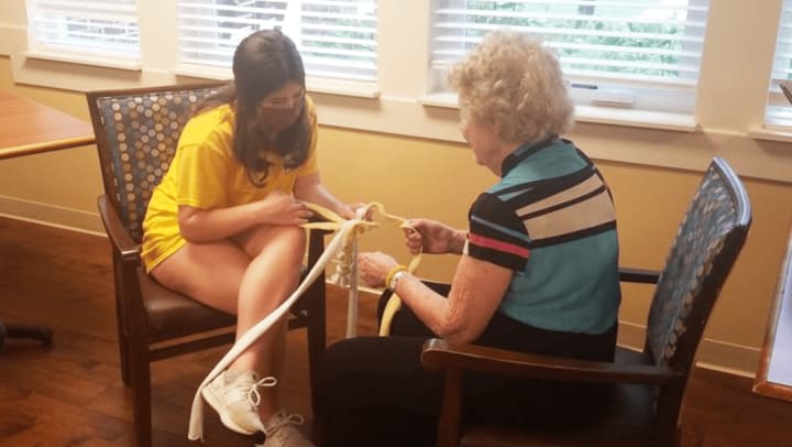 Harvester Place Memory Care residents make toys for local animal shelter