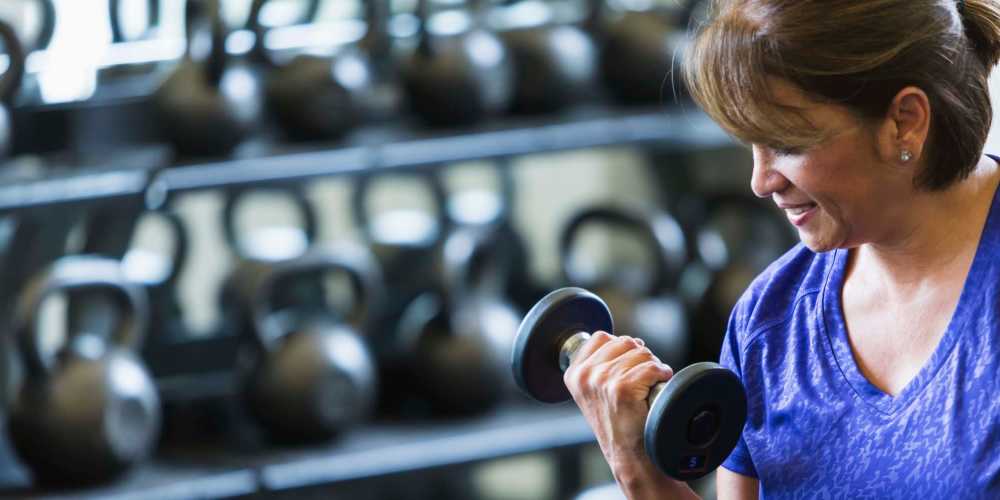 Woman working out in the gym at Villas at Fort Mill in Fort Mill, South Carolina
