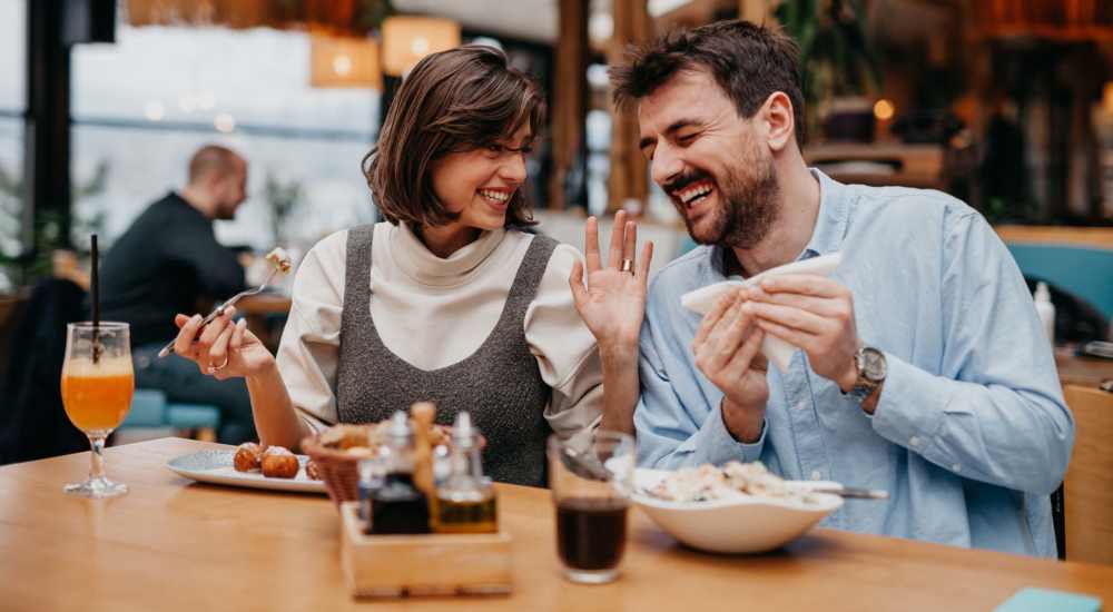 Residents enjoying food at a restaurant near Lawrence Road Apartments in Santa Clara, California