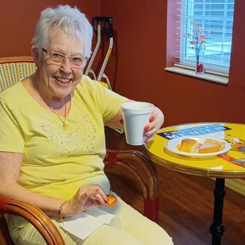 Resident smiling at The Oxford Grand Assisted Living & Memory Care in Wichita, Kansas