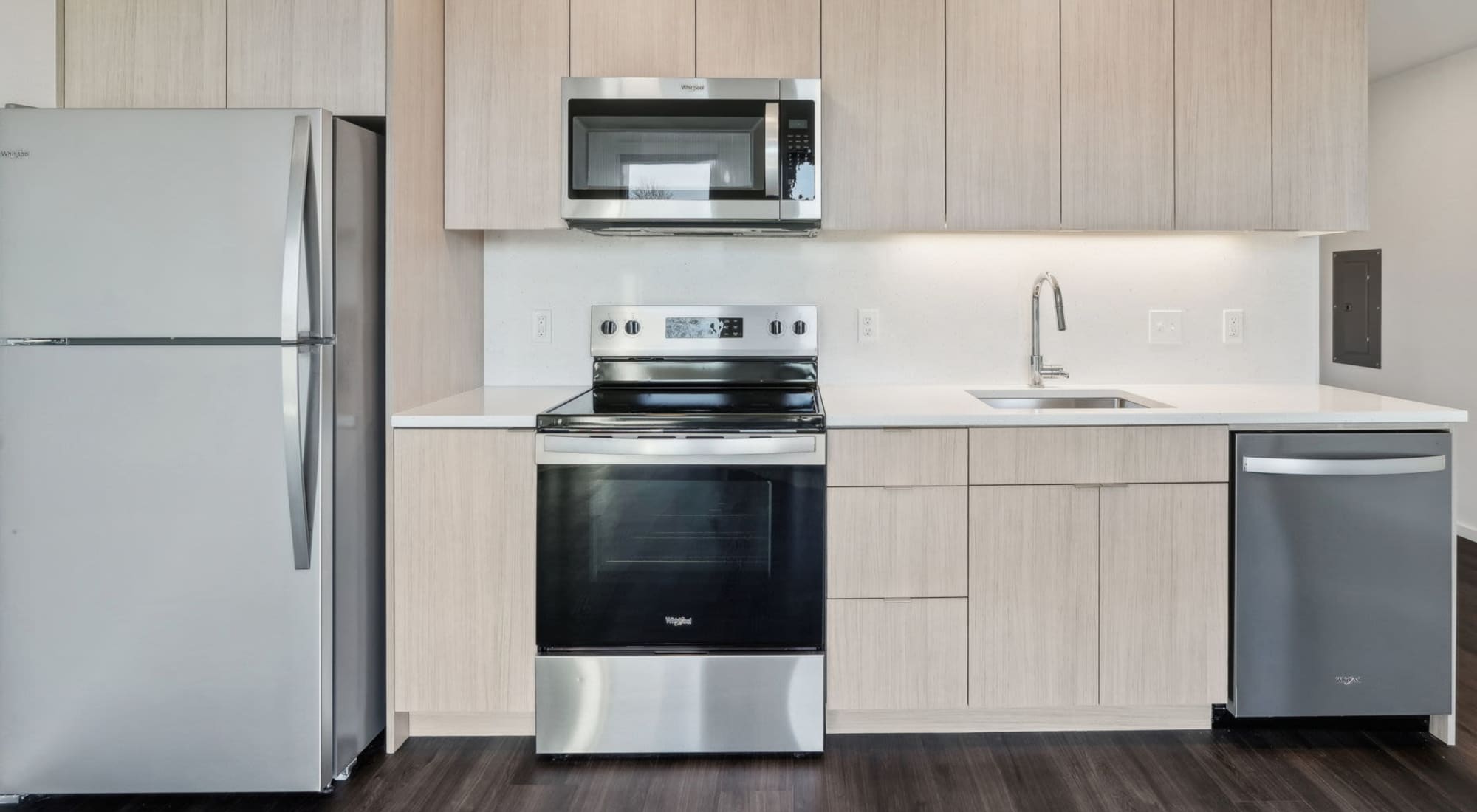 Modern kitchens with quartz countertops and designer cabinets at Rothko Residences in Portland, Oregon