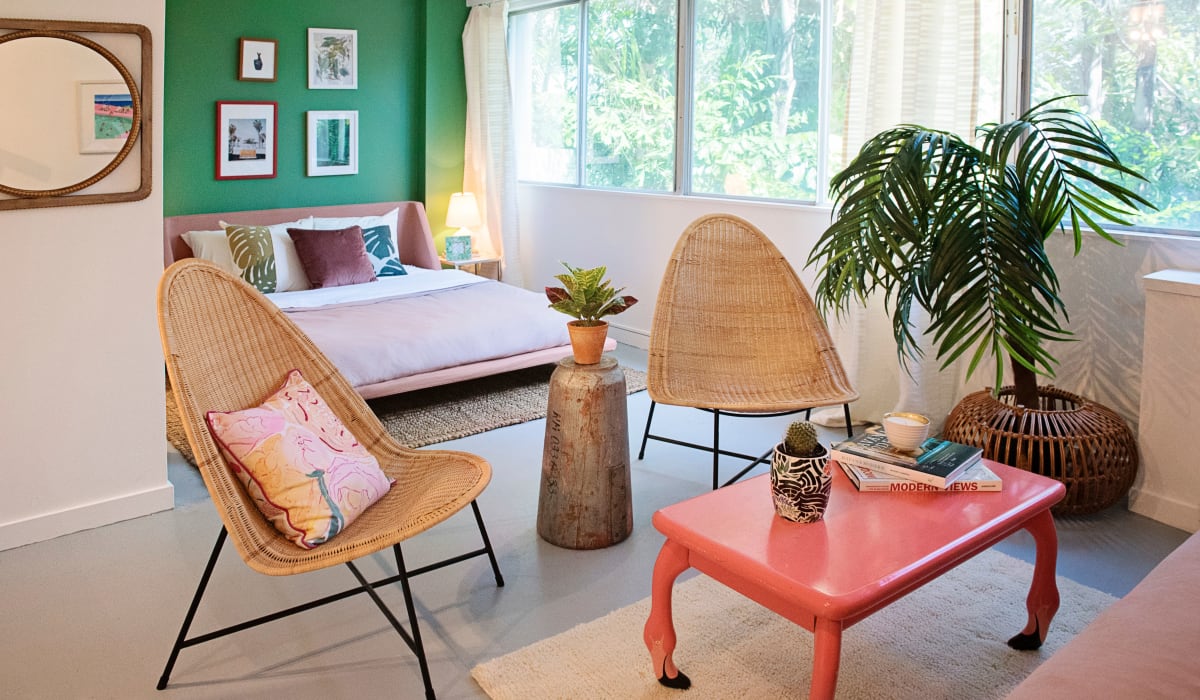 Large living area with nook for a futon and plenty of living space in model home at The Wayland in St Petersburg, Florida