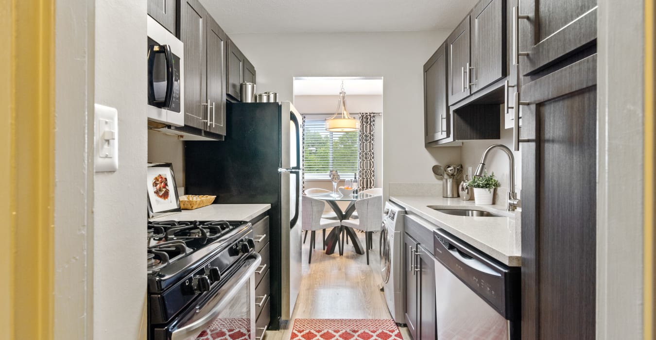 A kitchen with plenty of countertop space at Goldelm at 414 Flats in Knoxville, Tennessee