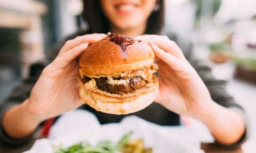 Delectable hamburger about to be enjoyed near Trinity Way in Fremont, California