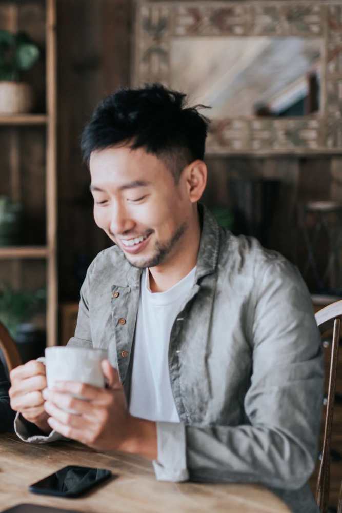 Resident having a cup of coffee near Palatia Apartment Homes in San Antonio, Texas