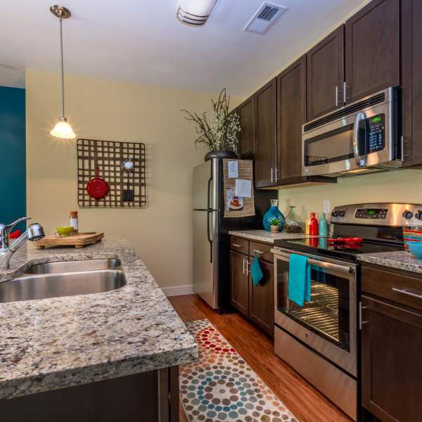 Kitchen with modern appliances at Promenade Pointe, Norfolk, Virginia