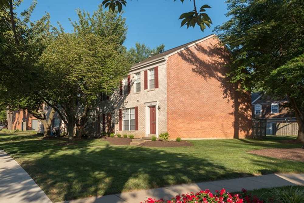 Exterior of apartments with walkway at Scarborough Square in Rockville, Maryland