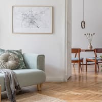 Wood flooring in an apartment living room and dining room at Reagan Crossing in Covington, Louisiana