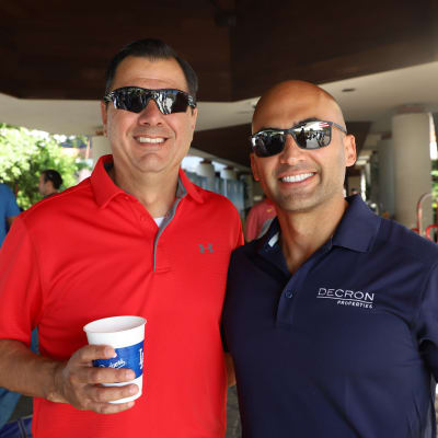 Team mates at a golf tournament Decron Properties, Los Angeles, California