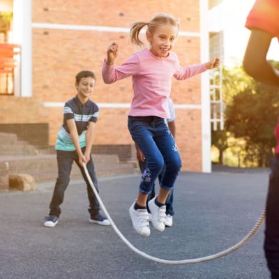 Children jumping rope at a school near at Broadmoor in Joint Base Lewis-McChord, Washington