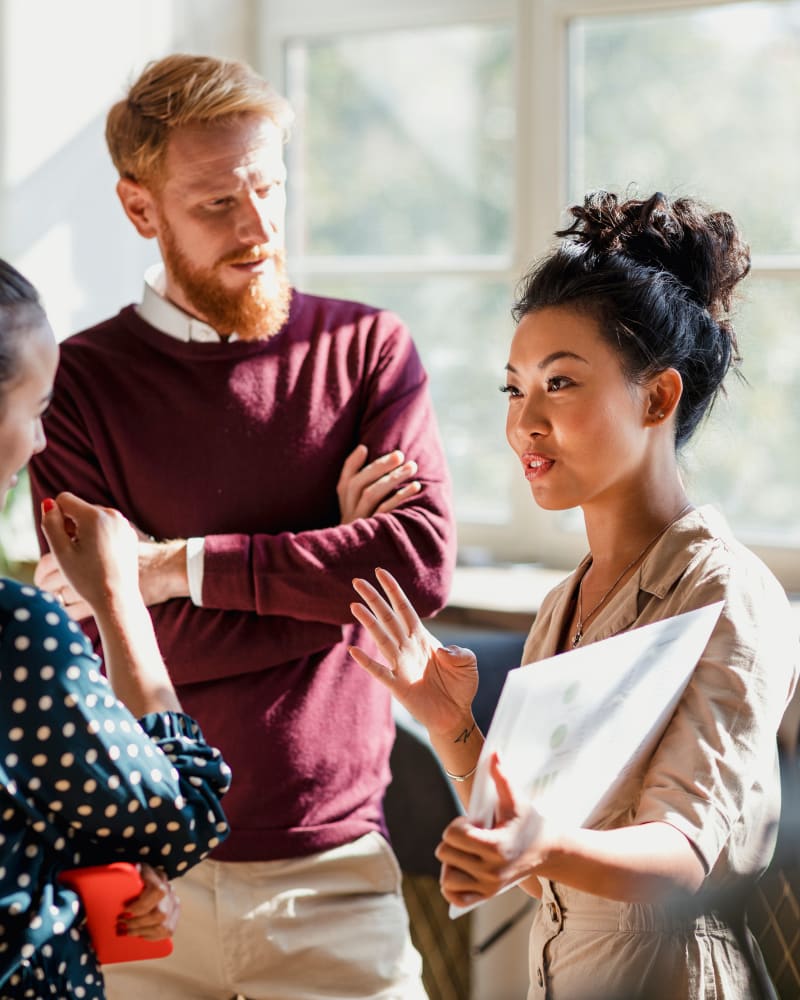 People in office talking at Horizon Realty in Jacksonville, Florida