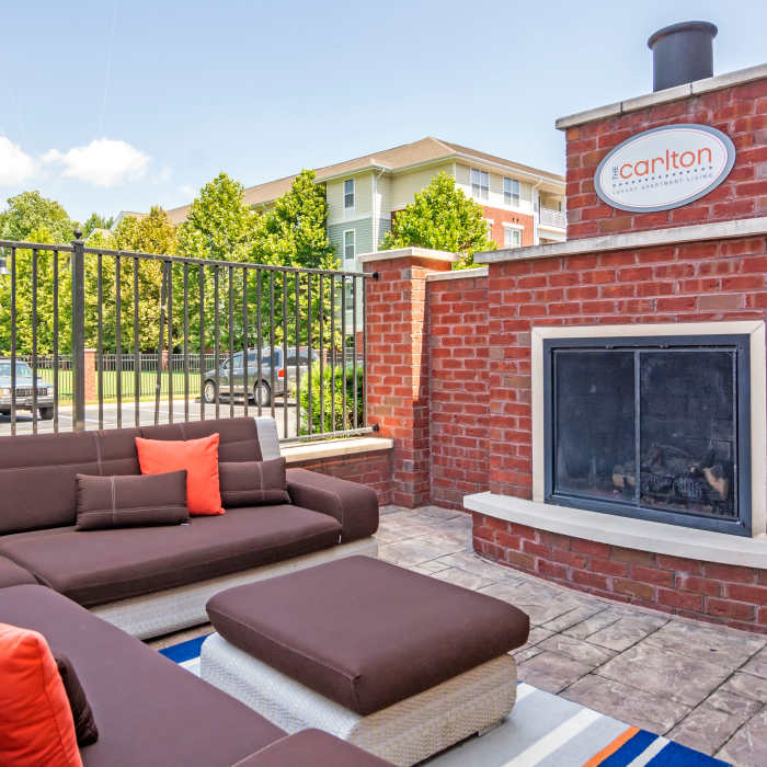 Outdoor lounge and fireplace at The Carlton at Greenbrier, Chesapeake, Virginia