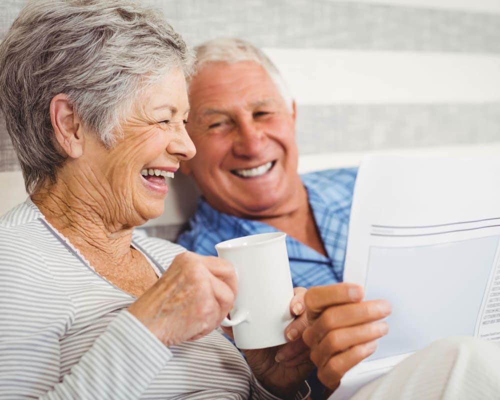 Residents enjoy morning news in apartment at The Preserve of Roseville in Roseville, Minnesota.
