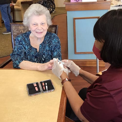 Residents bowling at Oxford Glen Memory Care at Grand Prairie in Grand Prairie, Texas