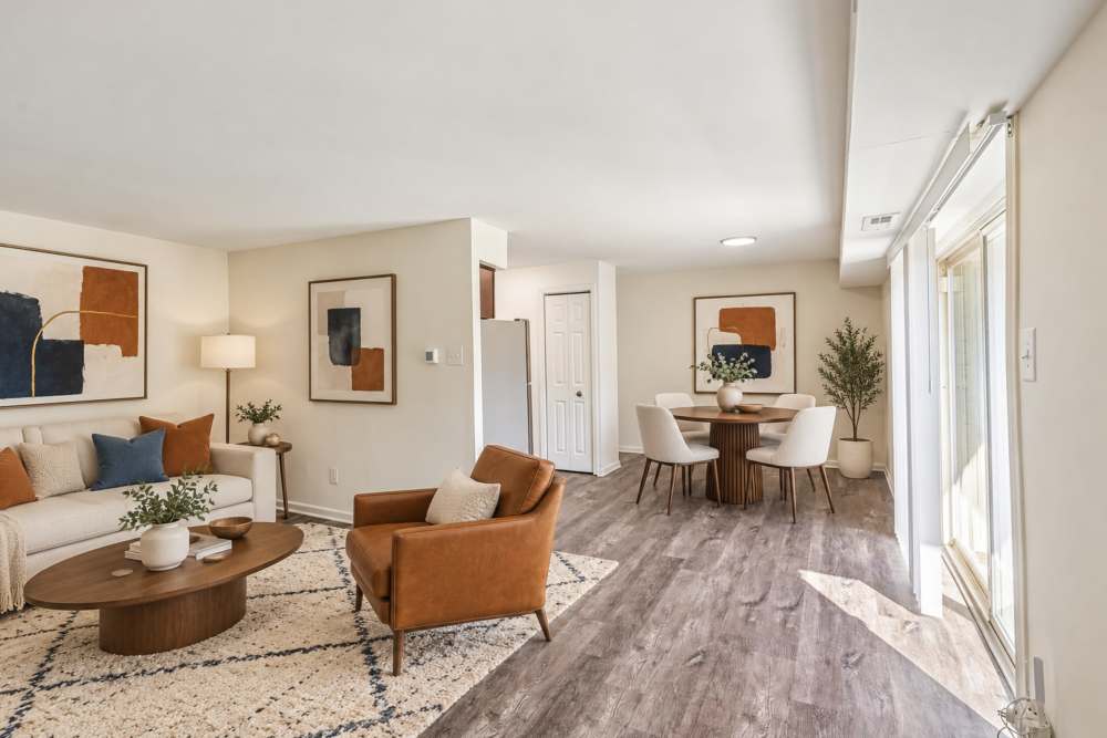 Dining area with vinyl plank flooring at Chesterfield Apartment Homes in Levittown, Pennsylvania